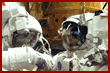 Parazynski and Titov in the Atlantis's payload bay during their EVA 